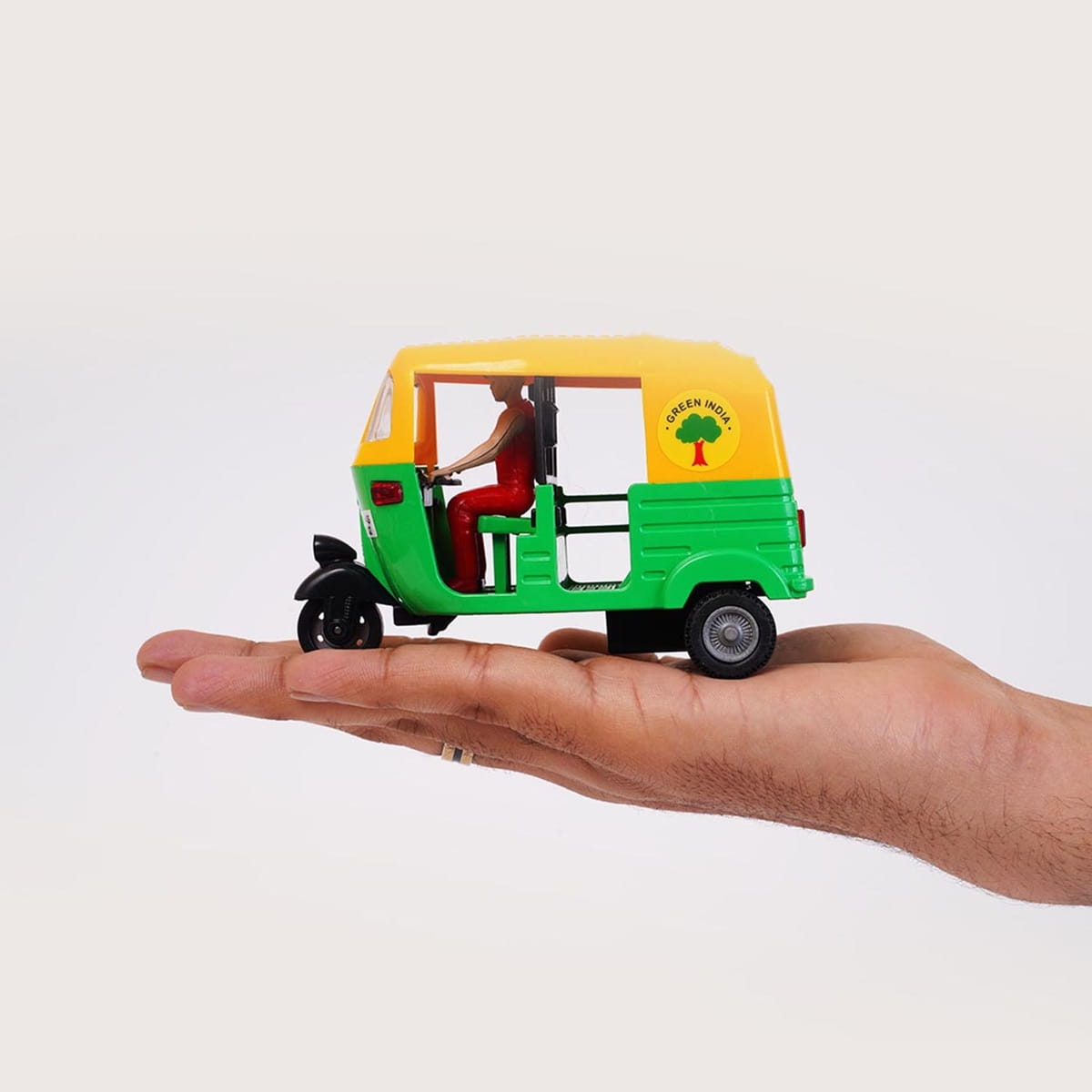 Side view of Offer Hunters Green CNG Auto Rickshaw toy showing realistic body graphics and passenger entrance.