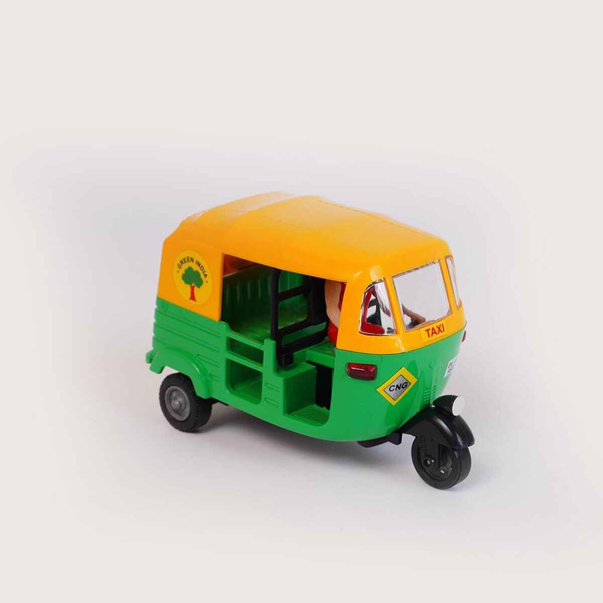 Front view of the toy Tuk Tuk showing the handlebar, windshield, and headlight details of the CNG auto