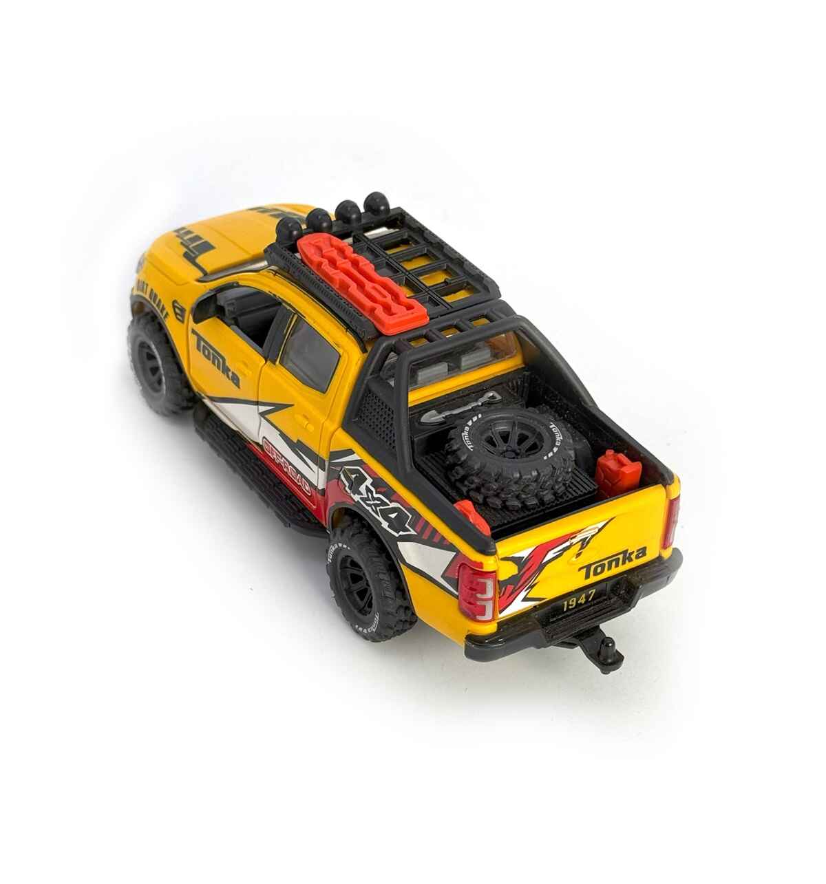 Back view of Offer Hunters yellow off road toy vehicle showing spare wheel, jerry cans, tow bar, and openable tailgate