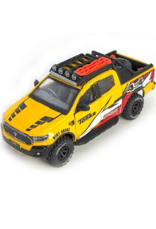 Front view of yellow Offer Hunters Tonka Off Roader toy SUV featuring roof carrier fog lights, traction board, and rugged bumper graphics