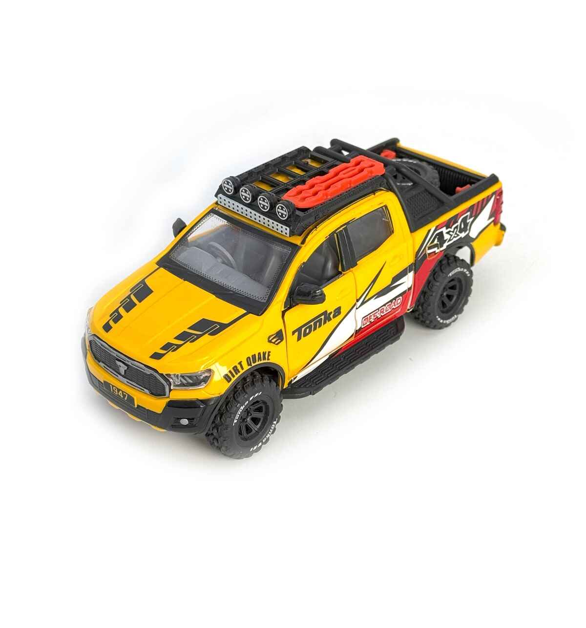 Front view of yellow Offer Hunters Tonka Off Roader toy SUV featuring roof carrier fog lights, traction board, and rugged bumper graphics